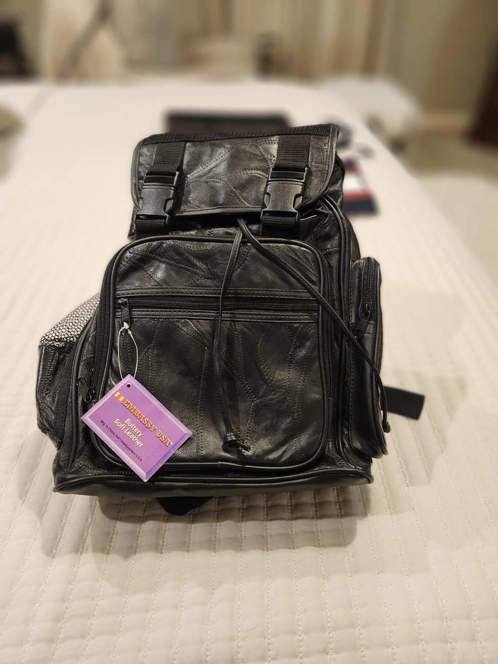 Sleek Black Women's Backpack with Front Zip Pocket